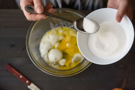 Baking pancakes in rural kitchenの写真素材