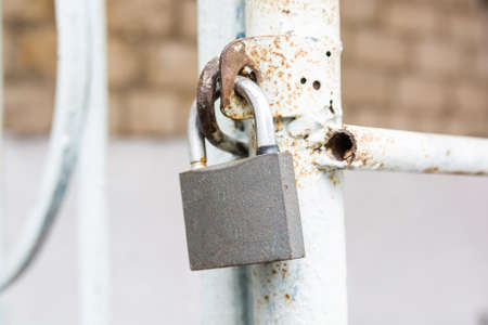 Hanging metal padlockの写真素材