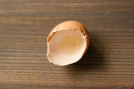 Eggshell on the wooden tableの写真素材