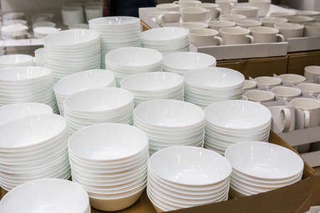 Empty porcelain bowls in supermarketの写真素材