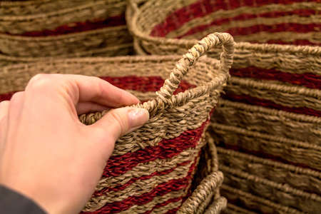 Wicker woven baskets in supermarketの写真素材