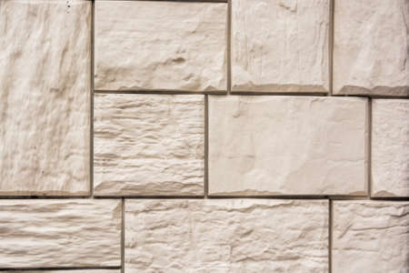 Beige brick wall background textureの写真素材