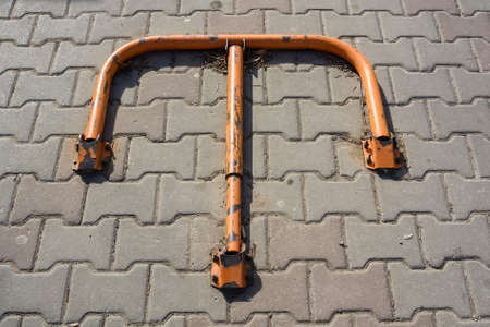 Folding barrier prevents parking