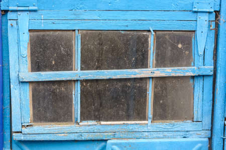 Close up old blue wooden frame windowの写真素材
