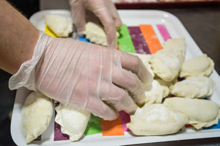 Cooking traditional Russian dumplings varenikiの写真素材