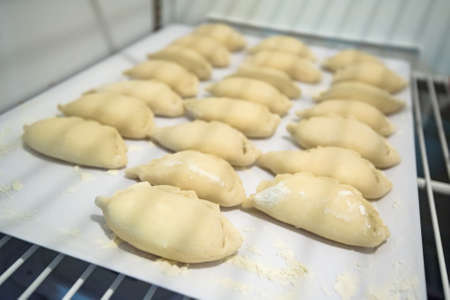 Cooking traditional Russian dumplings varenikiの写真素材