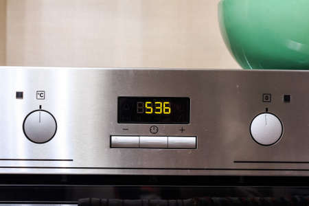 Modern metal oven controlsの写真素材