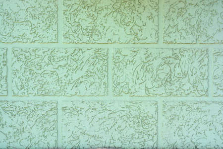 Close up uneven plaster surface texture backgroundの写真素材