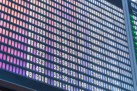 Close up departure board in airport backgroundの写真素材