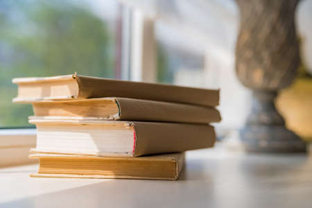 Old books on shelfの写真素材