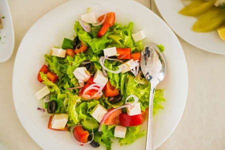 Greek salad in plateの写真素材