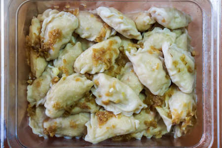 Close up vareniki or Russian dumplings with onionの写真素材