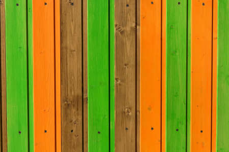 Modern wooden planks painted in colorful linesの写真素材