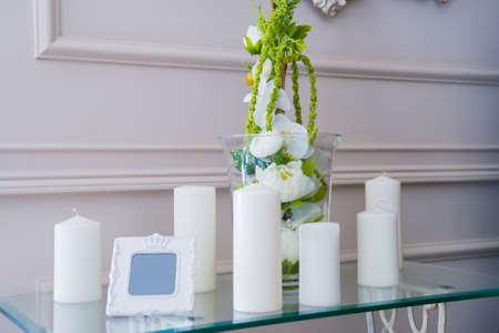 Decorative unlit candles in restaurant