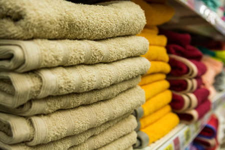 Fragment of a home wardrobe with towelsの写真素材