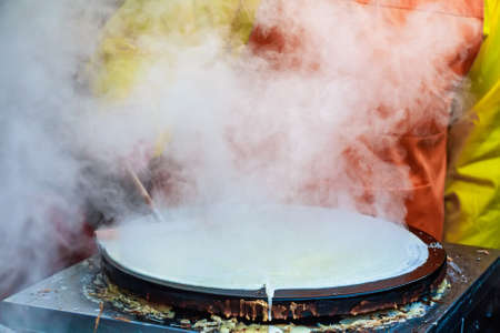 Cooking pancake outdoorsの写真素材