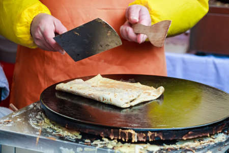Cooking pancake outdoorsの写真素材