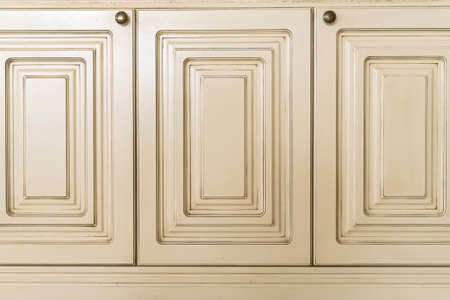Close-up white cupboard wooden doorsの写真素材