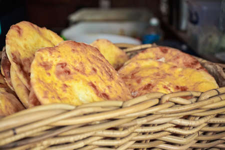 Georgian khachapuri flat cake with cheese on plateの写真素材