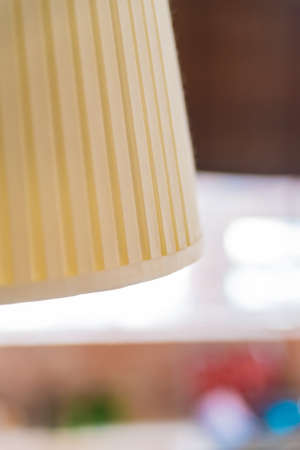 Close up white table lamp with blurred backgroundの写真素材