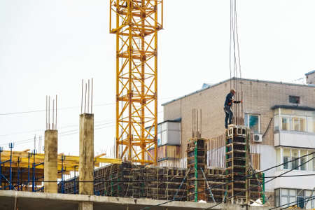 Construction site of building with workerの写真素材