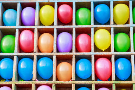 Multi-colored balloons in the cellsの写真素材