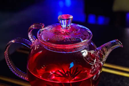 Close up transparent glass teapot in cafeの写真素材