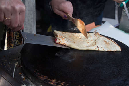 Cooking pancake outdoors