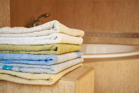 Colorful towels lie in the bathroomの写真素材