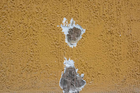 Cracked old cement plaster textureの写真素材