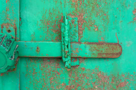Old metal door hingeの写真素材