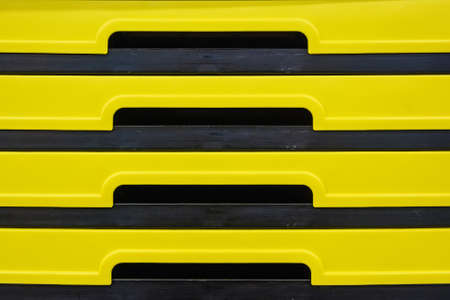 Colorful plastic boxes stacked one upon the otherの写真素材