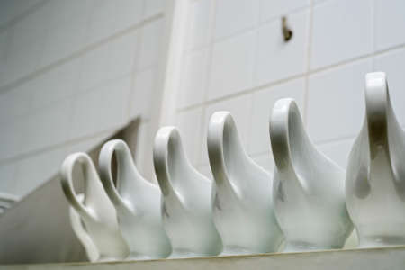 Clean empty ceramic sauce boats in restaurantの写真素材