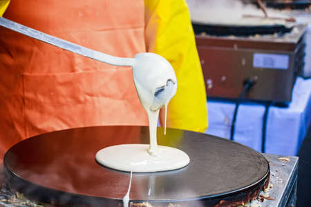 Cooking pancake outdoorsの写真素材