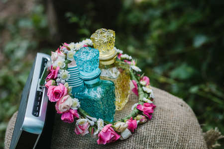 Two small colorful glass bottles for decorationの写真素材