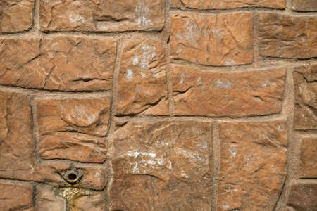 Brown stone wall background texture