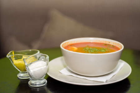 Red vegetable soup in restaurantの写真素材