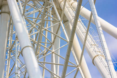 Close up white pipes of Ferris wheelの写真素材