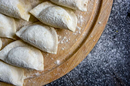 Cooking traditional Russian dumplings varenikiの写真素材