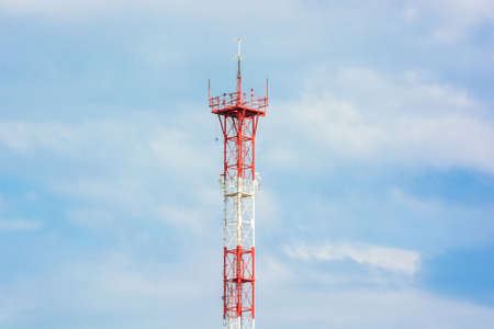 Communications tower on blue sky backgroundの写真素材
