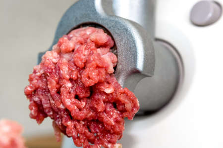 Closeup of front part of meat grindeの写真素材