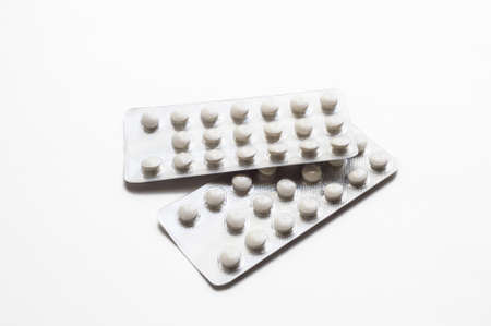 Packs of pills isolated on white backgroundの写真素材