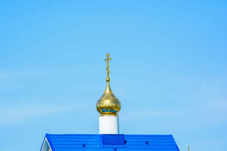 Detail of small Orthodox church with golden crossの写真素材