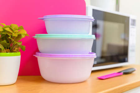 Bright plastic tablewareの写真素材