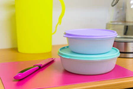 Bright plastic tablewareの写真素材