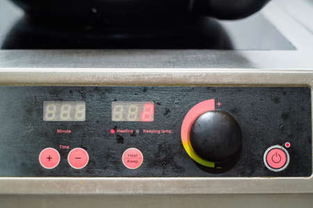 Close up electric stove controlsの写真素材