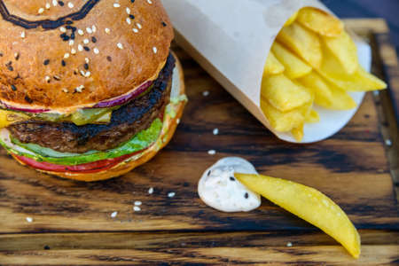 Fresh hamburger with potato wedgesの写真素材