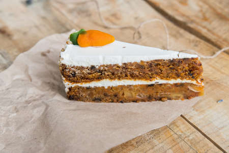 Piece of carrot cake on paperの写真素材