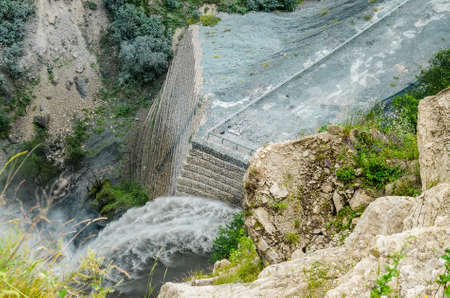 Stone wall for river bank protection in mountains