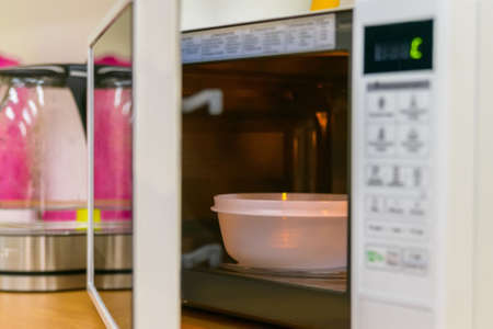 Close up opened modern microwave ovenの写真素材